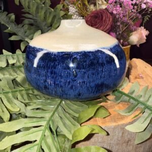 Artisan made stoneware vase.