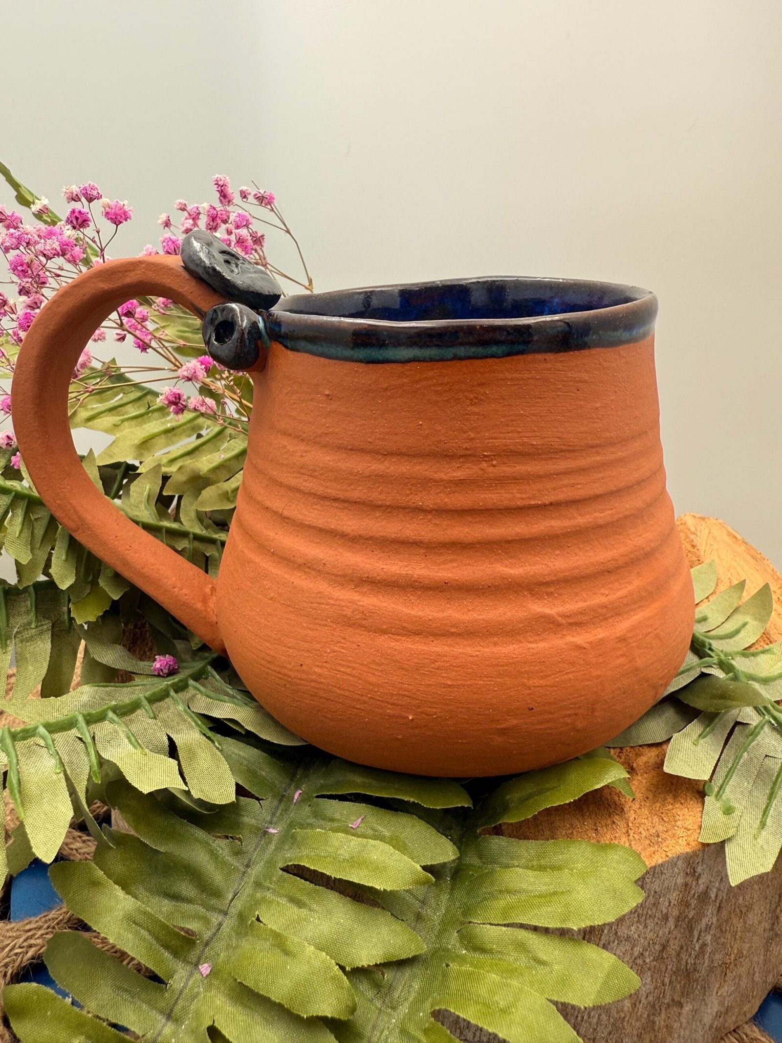 Southwestern style terra-cotta and brilliant blue glazed Coffee mug.17+ Oz hand made.