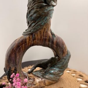 Hand sculpted  stoneware blue whale vase.