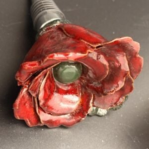 Hand sculpted, ceramic rose wine stopper.