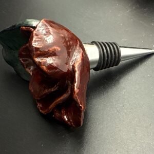 Hand sculpted, ceramic rose wine stopper.