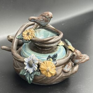 Hand sculpted ceramic stoneware,Mama and papa with baby and nest Bird  bowl with lid. Authentic gold accents.